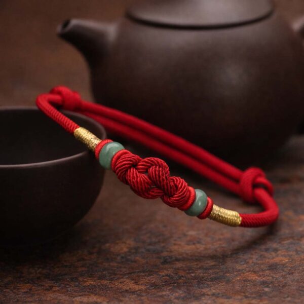 eastern-story-red-thread-of-intention-detail-knot-jade. eastern-story-red-thread-of-intention-detail-knot-jade.