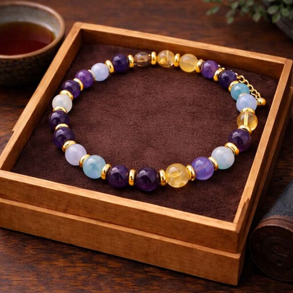 Strength Bracelet – Presentation View Strength gemstone bracelet presented in a wooden box