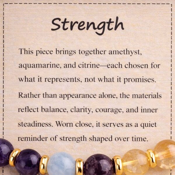 Strength Bracelet – Symbolic Meaning Strength gemstone bracelet displayed with symbolic meaning card
