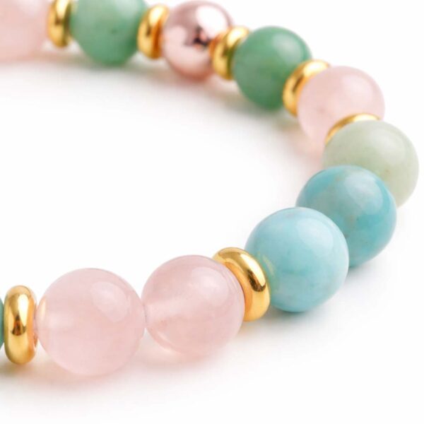 Love & Connection Bracelet – Material Detail Close-up detail of a love and connection gemstone bracelet with rose quartz, amazonite, and green aventurine beads