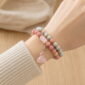 Blush Harmony Double-Wrap Stone Bracelet, faceless natural wrist wearing the product
