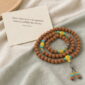 Bright Horizon 108-Bead Bodhi Seed Mala, mala on premium textile with a meaning card