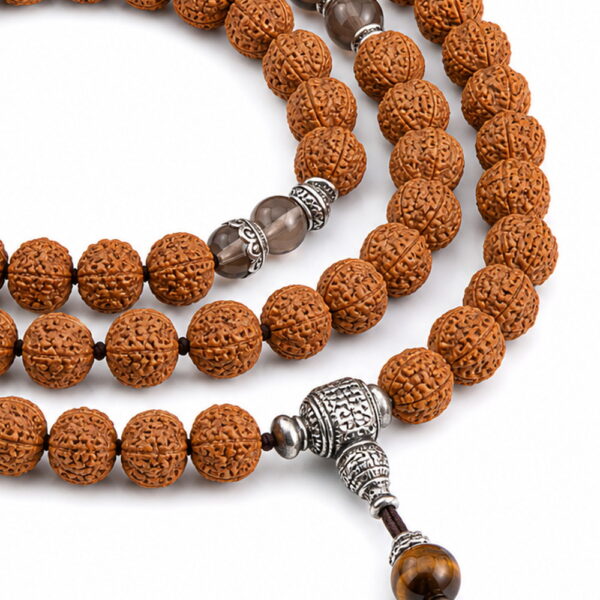 Cloud Path 108-Bead Bodhi Seed Mala - Detail Cloud Path 108-Bead Bodhi Seed Mala, close detail of seed texture, accent beads, connector, and drop