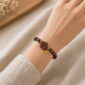 Deep Blossom Rosewood Bracelet, faceless natural wrist wearing the product