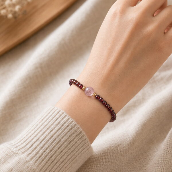 Gentle Ember Garnet & Pink Quartz Bracelet - Wrist Gentle Ember Garnet & Pink Quartz Bracelet, faceless natural wrist wearing the product