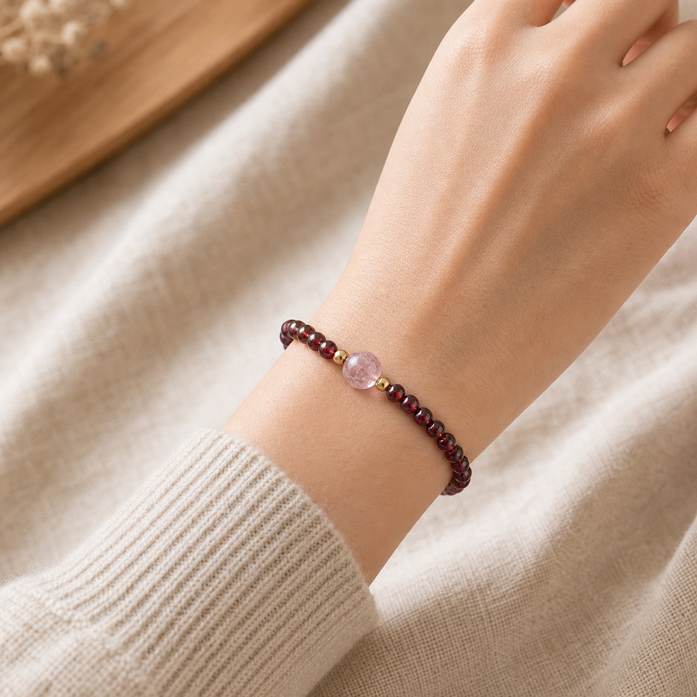 Gentle Ember Garnet & Pink Quartz Bracelet, faceless natural wrist wearing the product