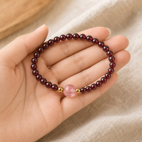 Gentle Ember Garnet & Pink Quartz Bracelet - Handheld Gentle Ember Garnet & Pink Quartz Bracelet, product held naturally in one hand
