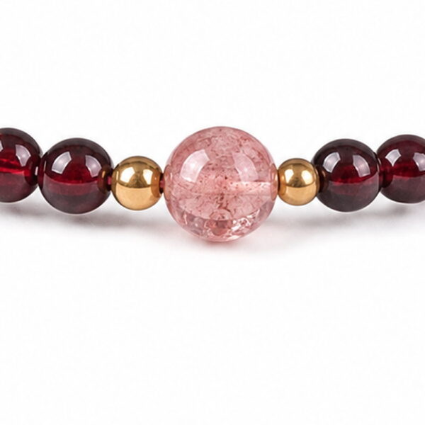 Gentle Ember Garnet & Pink Quartz Bracelet - Detail Gentle Ember Garnet & Pink Quartz Bracelet, close detail of beads, centerpiece, cord, and drop