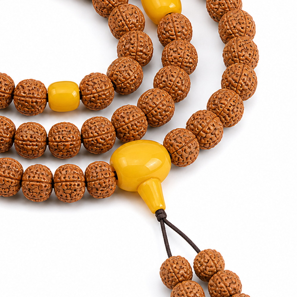 Golden Harvest 108-Bead Bodhi Seed Mala, close detail of seed texture, accent beads, connector, and drop