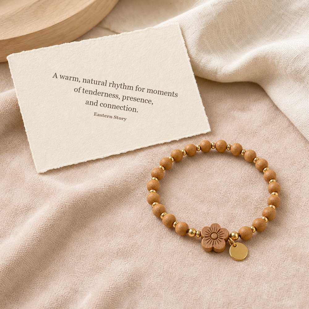 Peach Blossom Sandalwood Bracelet, product on premium textile with a meaning card