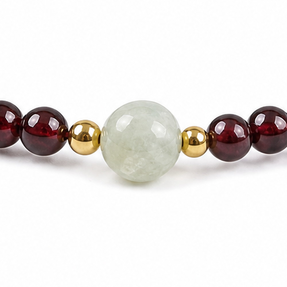 Quiet Glow Garnet & Pale Stone Bracelet, close detail of beads, centerpiece, cord, and drop