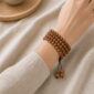Quiet Path 108-Bead Bodhi Seed Mala, faceless multi-wrap wrist view