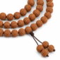 Quiet Path 108-Bead Bodhi Seed Mala, close detail of seed texture, accent beads, connector, and drop