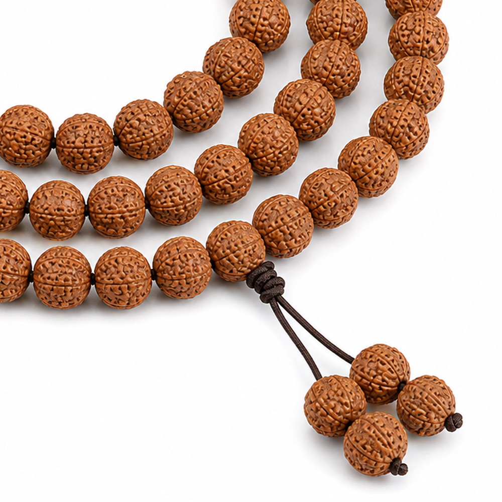 Quiet Path 108-Bead Bodhi Seed Mala, close detail of seed texture, accent beads, connector, and drop