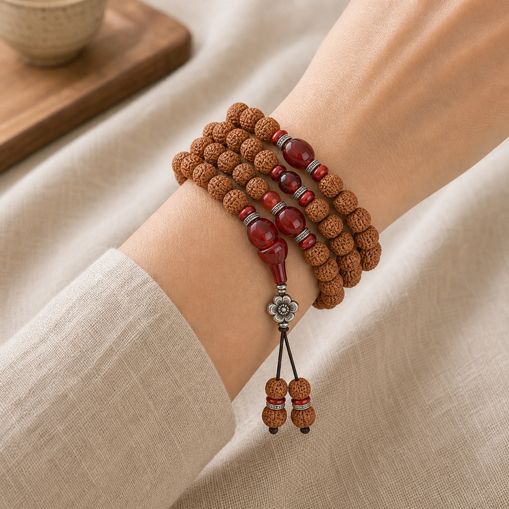 Red Harmony 108-Bead Bodhi Seed Mala, faceless multi-wrap wrist view