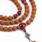 Red Harmony 108-Bead Bodhi Seed Mala, close detail of seed texture, accent beads, connector, and drop