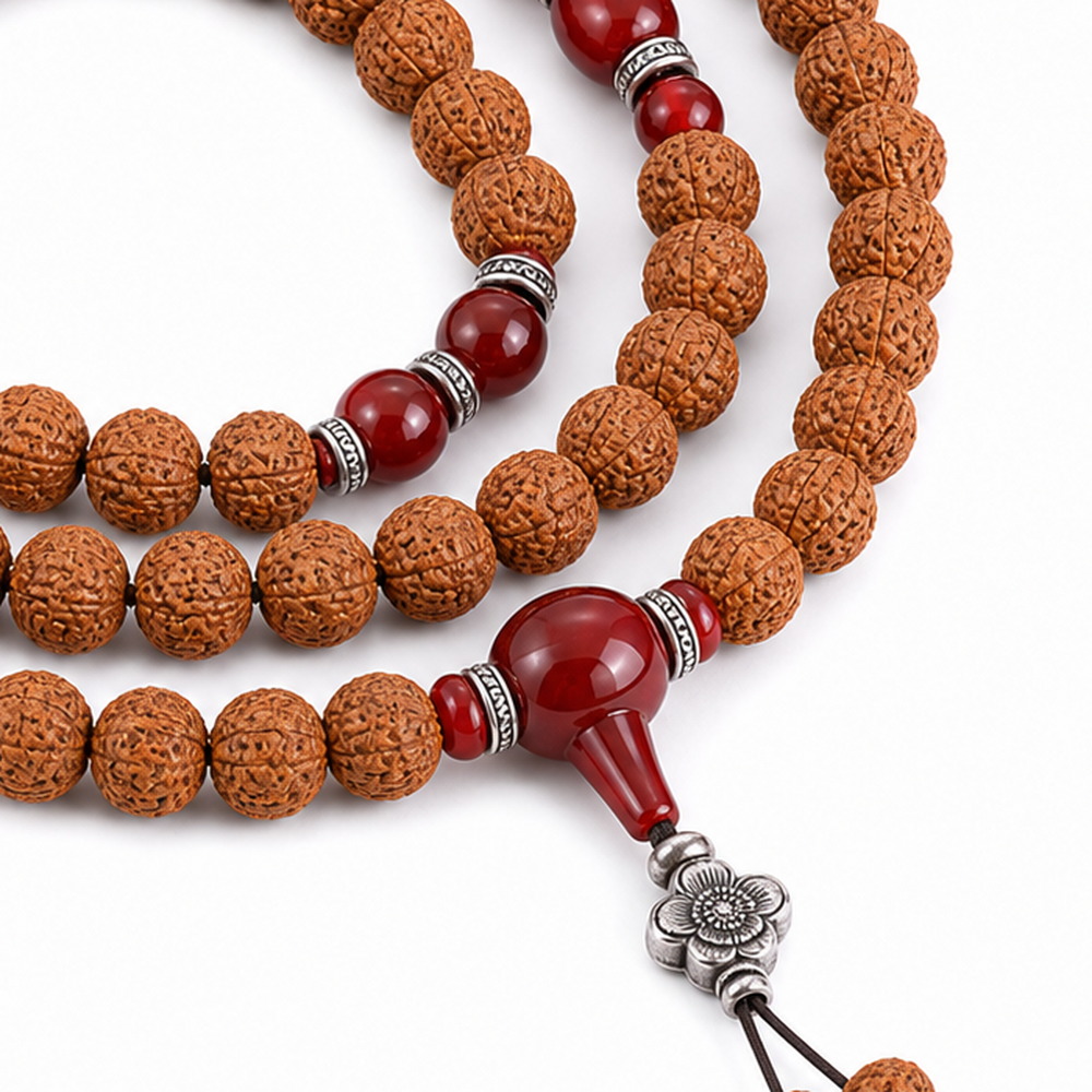 Red Harmony 108-Bead Bodhi Seed Mala, close detail of seed texture, accent beads, connector, and drop