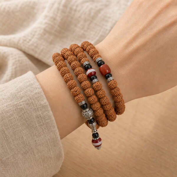 Rising Sun 108-Bead Bodhi Seed Mala - Multi Wrap Wrist Rising Sun 108-Bead Bodhi Seed Mala, faceless multi-wrap wrist view
