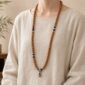 Rising Sun 108-Bead Bodhi Seed Mala, faceless long-necklace view from collarbone to waist