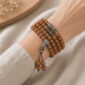 Steady Ascent 108-Bead Bodhi Seed Mala, faceless multi-wrap wrist view