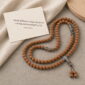 Steady Ascent 108-Bead Bodhi Seed Mala, mala on premium textile with a meaning card