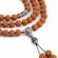 Steady Ascent 108-Bead Bodhi Seed Mala, close detail of seed texture, accent beads, connector, and drop