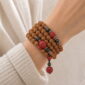 Steady Flow 108-Bead Bodhi Seed Mala, faceless multi-wrap wrist view
