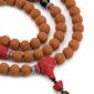 Steady Flow 108-Bead Bodhi Seed Mala, close detail of seed texture, accent beads, connector, and drop