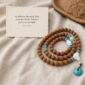 Still Waters 108-Bead Bodhi Seed Mala, mala on premium textile with a meaning card