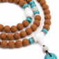 Still Waters 108-Bead Bodhi Seed Mala, close detail of seed texture, accent beads, connector, and drop