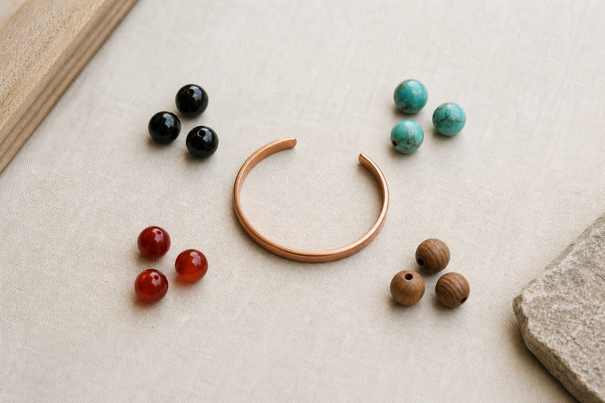 Red copper cuff surrounded by black obsidian, turquoise, red agate, and brown wood beads