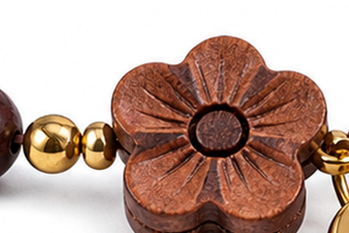 Close view of dark red-brown wood beads with visible grain and polished surface