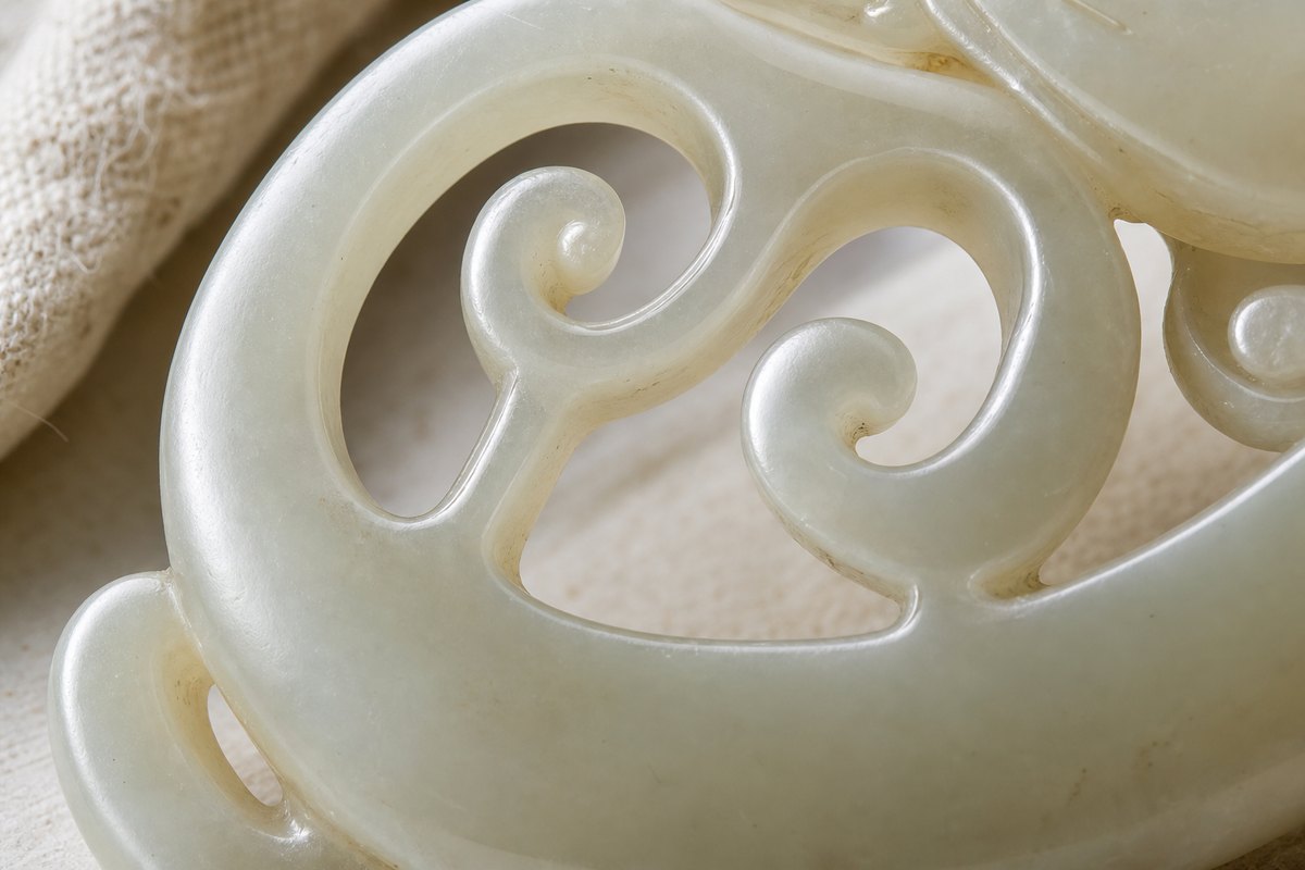Pierced carving / Tou Diao (透雕) jade detail showing smooth inner walls and layered depth