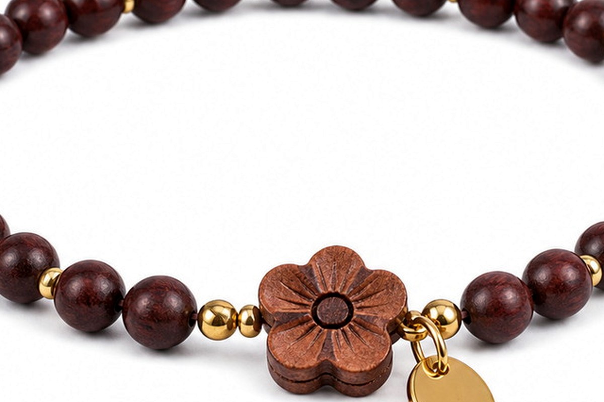 Polished dark wood beads with deep brown tone, smooth finish, and visible natural grain