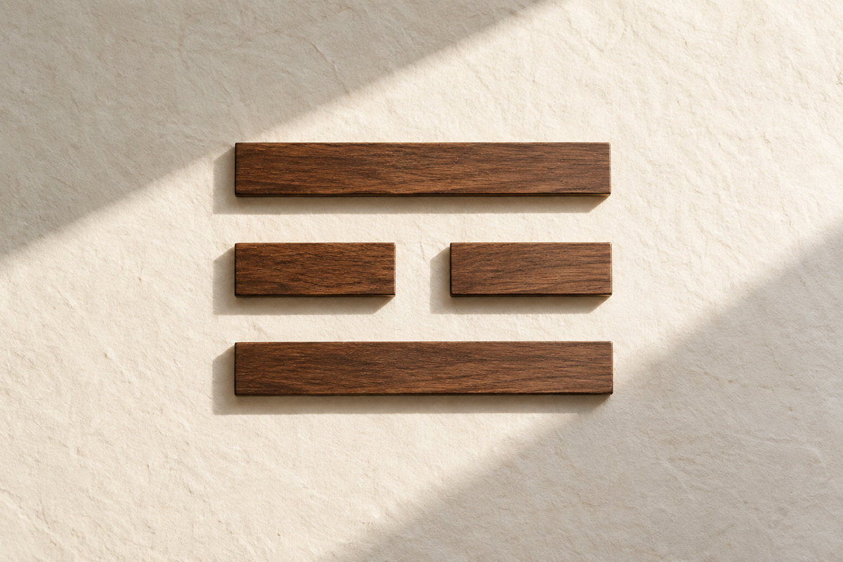 Three horizontal wooden rows form an unbroken, broken, unbroken trigram.